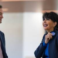 President Mantella talking with two other event guests